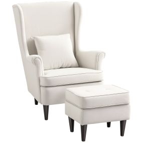 Sillón con reposapiés tapizado en lino beige con respaldo alto capitoné y patas de madera